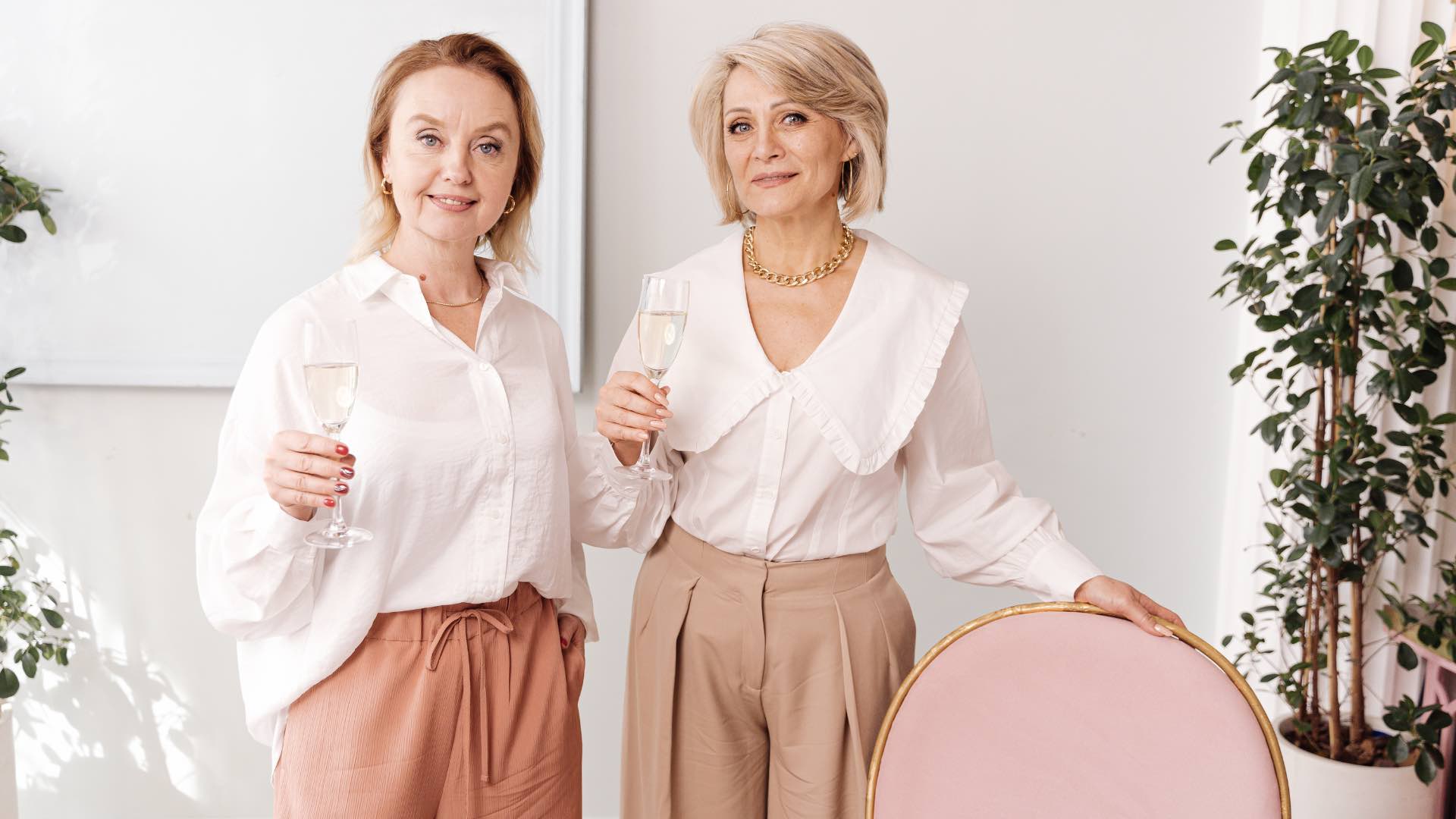 Ladies enjoying a Glass of champagne in summer